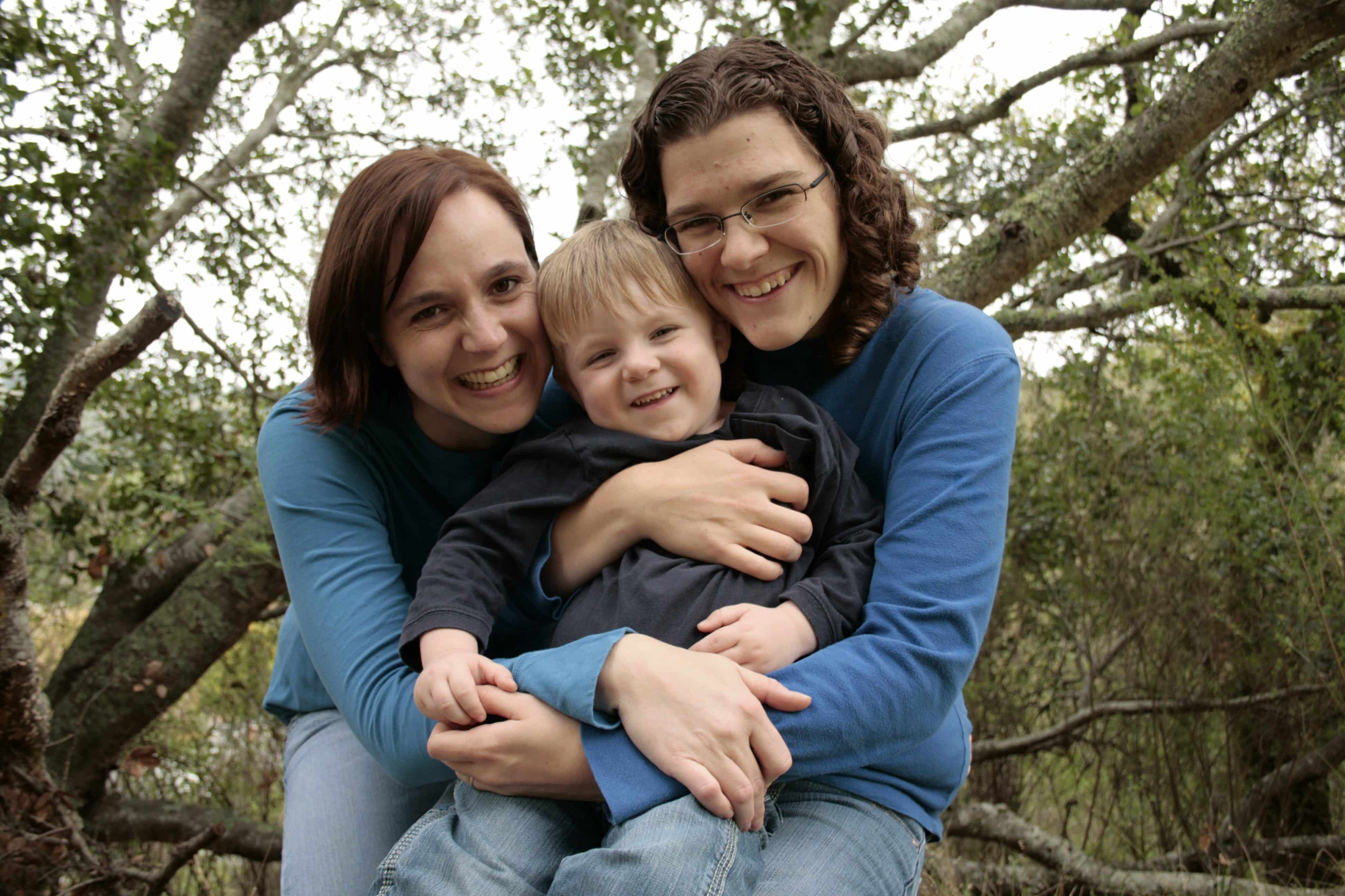 Mom, Dad and toddler in the forest