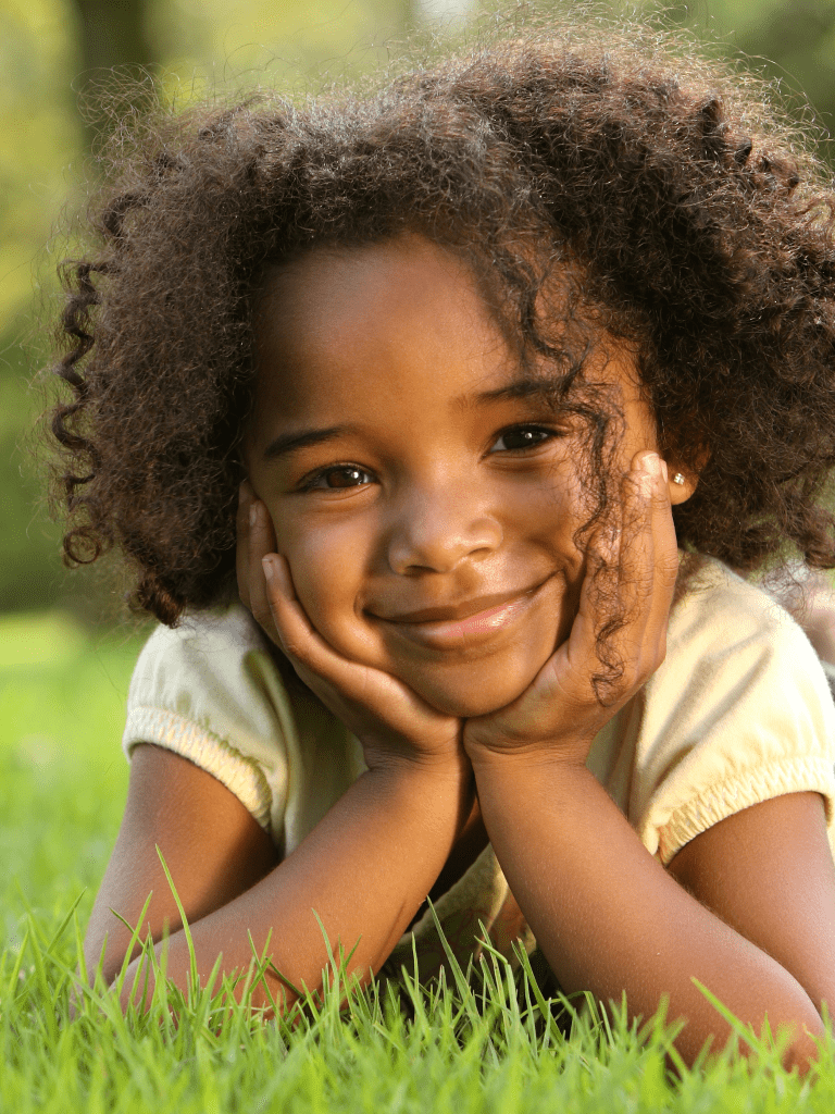 Afroamerican little girl posing for picture